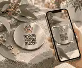 Phone testing a QR pet memorial plaque proof