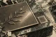 Bronze plaque with a discreet QR memorial detail