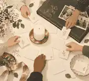 Grandchildren placing memory cards around a candle and family album