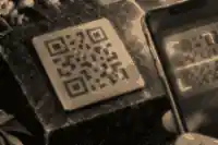 what happens if a qr plaque scratches: Scratched QR memorial plaque being tested by phone