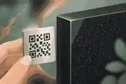 attach a qr plaque to granite: QR plaque positioned beside polished granite before installation