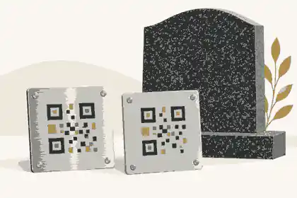 is stainless steel better than aluminium for memorial qr plaques: Stainless steel and aluminium QR plaque samples beside granite